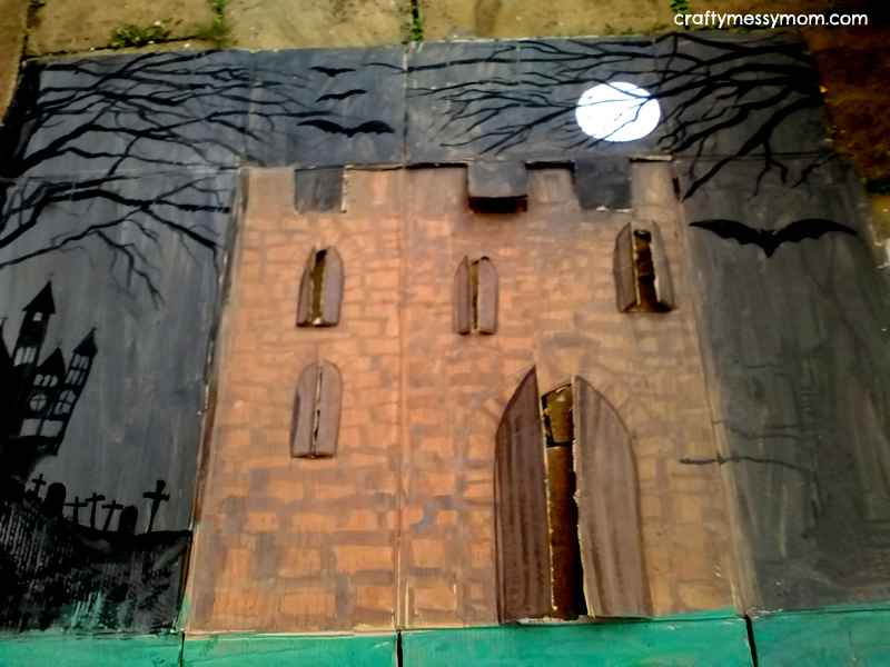 Working on a giant pop-up haunted castle | craftymessymom