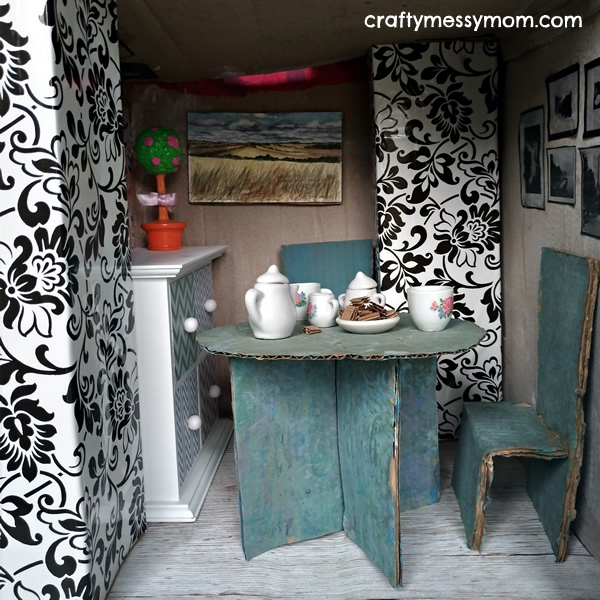 Barbie cardboard box house | dining room by craftymessymom.com