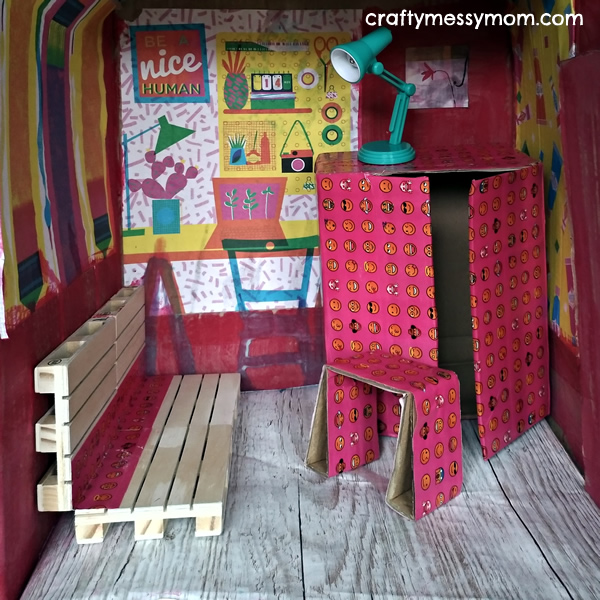 Barbie cardboard box house | living room by craftymessymom.com