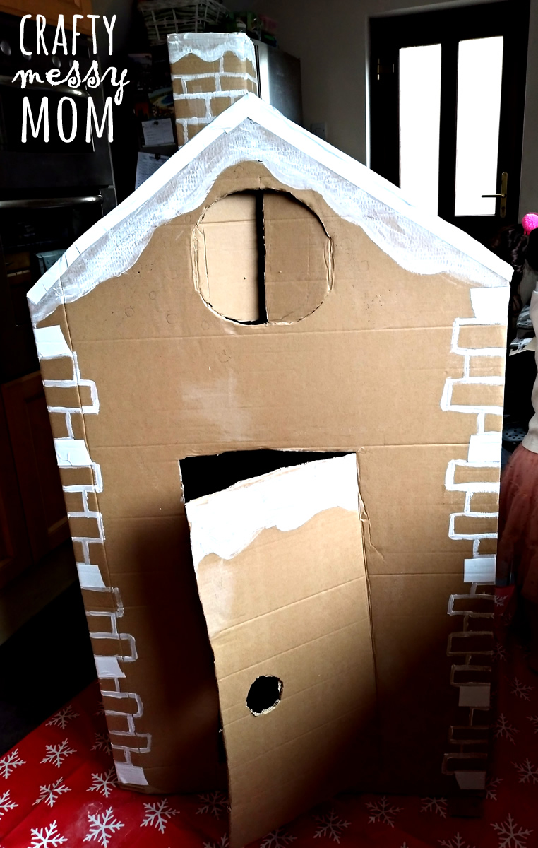 Christmas crafts - giant cardboard gingerbread house at craftymessymom.com